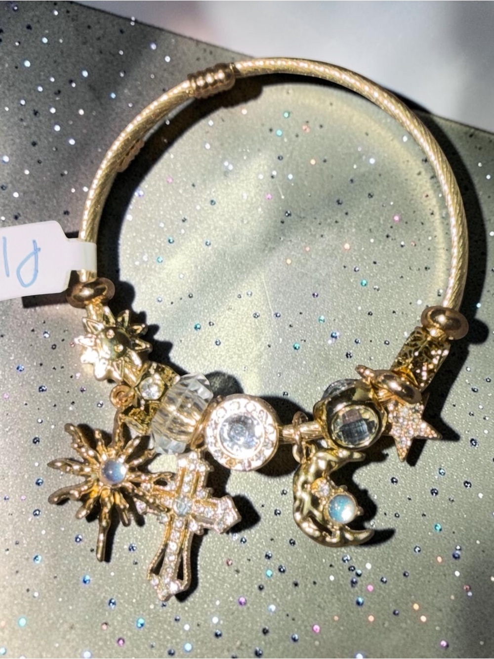 Gold Tone Celestial Moon Star Sun Cross Charm Bangle Bracelet